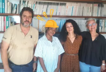 La jeune Issaky entourée de l'équipe de L'ATELIER Architectes et Ingénieurs